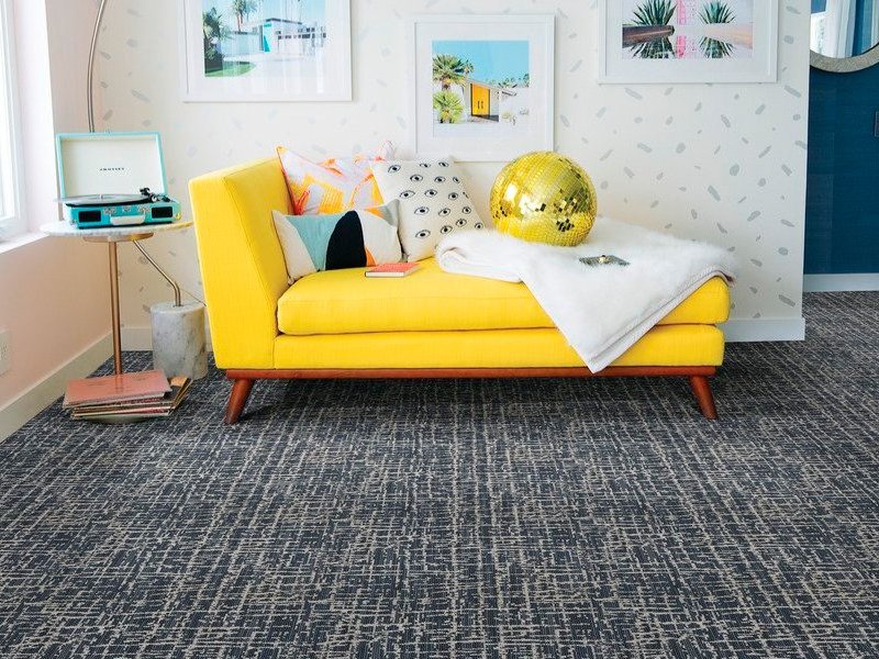 Yellow couch on carpet - Americarpets of Layton, UT